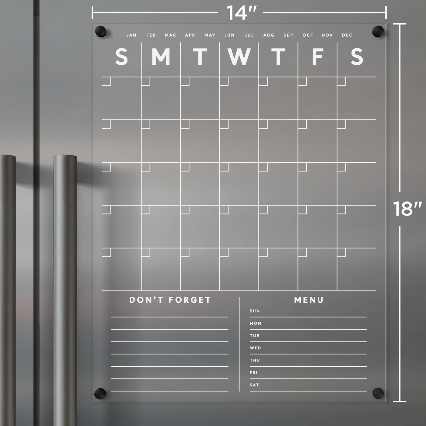 A Clear Acrylic Monthly Fridge Calendar by Girl Friday Shop, perfect for wet-erase markers, is mounted on a gray wall. It features month and weekday headers, customizable sections for Dont Forget and Menu, ample note space, black corner magnets, and silver handles.