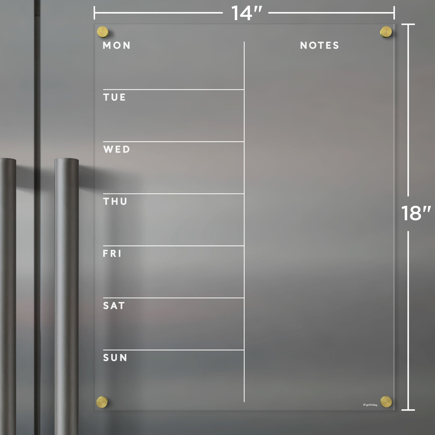 The Girl Friday Clear Acrylic Fridge Calendar is an elegant 14x18 planner with daily columns and a notes section. Mounted on gray with gold pegs, its compatible with wet-erase markers for easy updates.