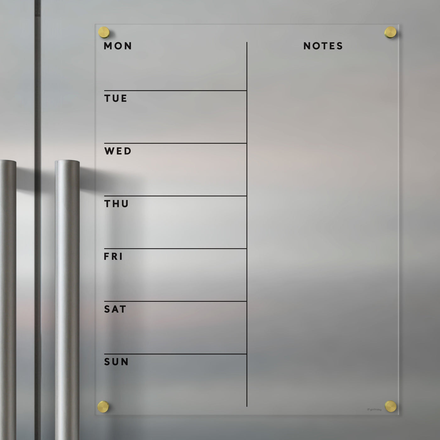 The Clear Acrylic Weekly Fridge Calendar | Week and Notes by Girl Friday is a minimalist planner with columns for Monday to Sunday, a notes section on the right, and can be mounted on metallic surfaces. It pairs perfectly with wet-erase markers and includes two metallic handles for easy handling.