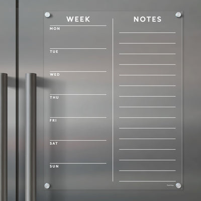 The Girl Friday Clear Acrylic Customizable Fridge Calendar | Week and Notes | White Text has two columns for weekdays and Notes with blank lines, attaches with four silver magnets, and works great with wet-erase markers.