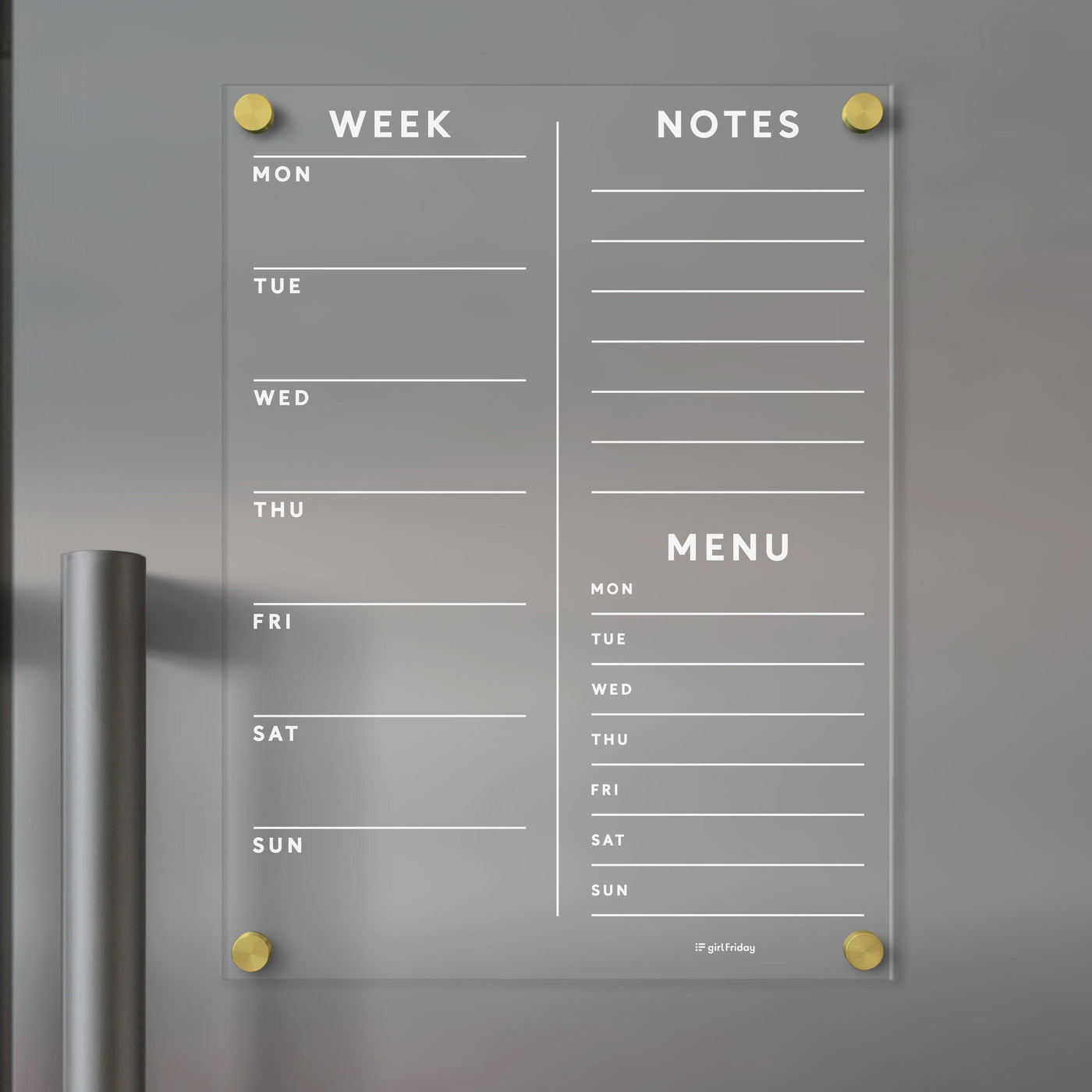 The Girl Friday Acrylic Fridge Planner displays sections for Week, Notes, and Menu with lined days from Monday to Sunday. Its mounted with gold-colored screws and can be customized using dry-erase markers.