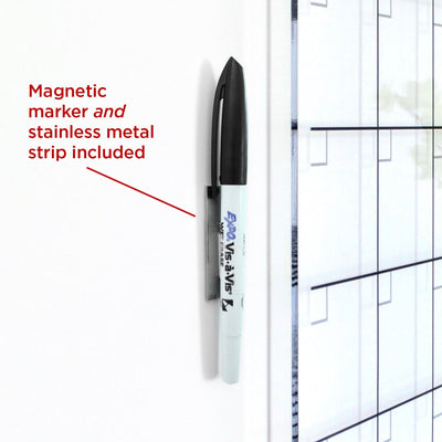 A black-capped marker attaches to the Clear Acrylic Customizable Monthly Wall Calendar by Girl Friday Shop using a magnetic holder. A red arrow points to it, labeled: Magnetic marker and stainless metal strip included. The whiteboard features a faint grid pattern for clear writing.